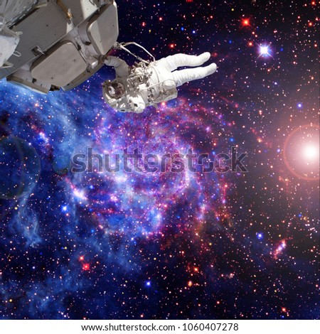 Astronaut and deep space. The elements of this image furnished by NASA.