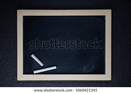 blackboard with wooden frame.