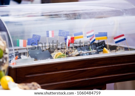 Cheese of different countries with flags