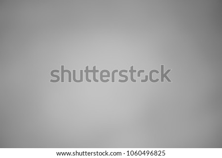 Grey gradient abstract blurred background.