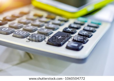 Calculator on white table for use in work