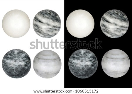 balls of gray marble with black and white streaks isolated on black and white backgrounds. Images can be used for making collages imitating cosmic scenes