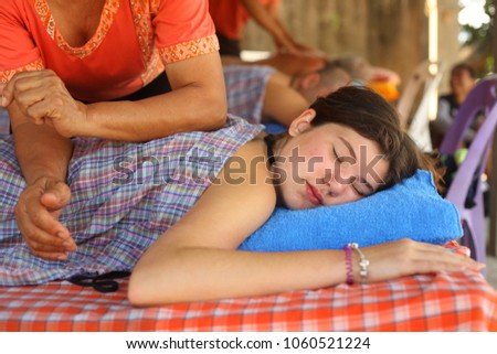 teenager pretty girl on thai massage procedure close up photo