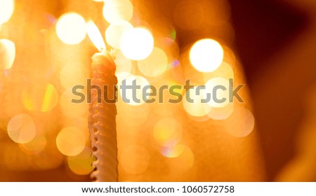 Candle , wedding candle with bokeh light background .
