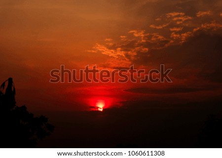 Natural Sunset or Sunrise over farm which it is countryside.
