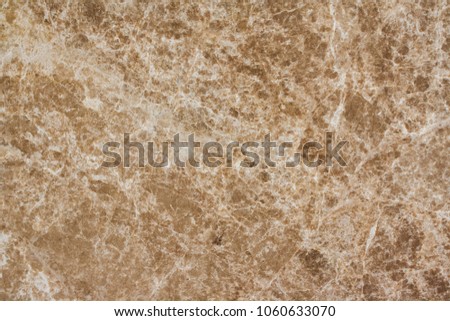 Polished beige marble. Real natural marble stone texture and surface background. Light emprador marble