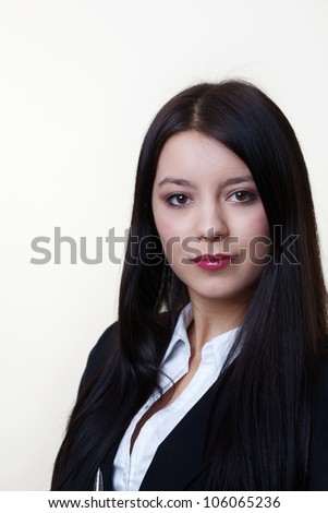 young business woman looking at camera