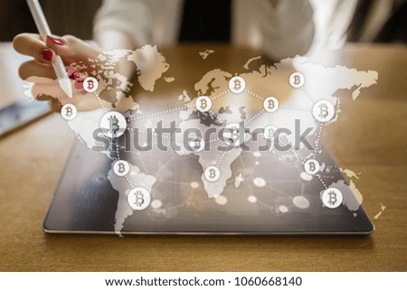 World map with bitcoin icons on virtual screen. Crypto currency. Blockchain technology. Internet payments.