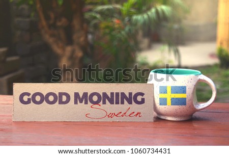 Sweden flag on the tea cup with a good morning message