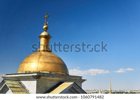 Dome of the Orthodox Church in the afternoon on a background of blue sky with clouds.