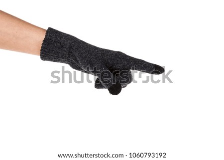 Side view of beautiful human hand palm dressed in new nice and soft natural wool fabric touch screen gloves isolated on abstract white background. Wearing and special clothes concept. Detailed closeup