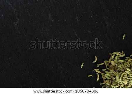 Spices fennel on the stone surface are large and place for advertising
