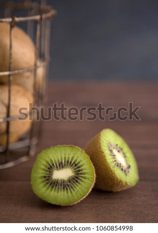 Sliced Kiwi Fruit on a Wooden Table