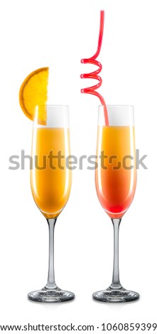Set of mimosa cocktails in champagne glass with colorful straw and orange slice isolated on white background. Clipping path