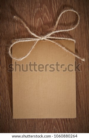 Blank paper. Vintage table top with blank paper. Old brown wooden boards and blank paper. Top view of blank paper page on wood background office desk and different objects. Minimal flat lay style.
