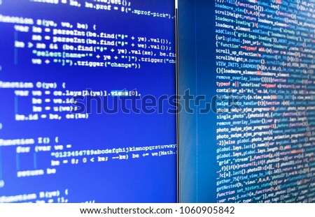 Hacker api text on the computer screen. IT business company. PHP syntax highlighted. Programming code typing. Coworkers team in modern office. SEO concepts for better SERP. Vivid colors. 