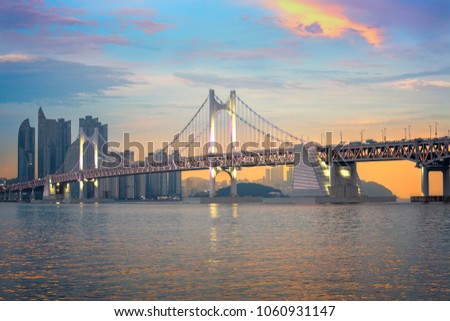 Gwangan bridge light up and beautiful twilight sky,sunset at Haeundae in Busan,Korea Royalty-Free Stock Photo #1060931147