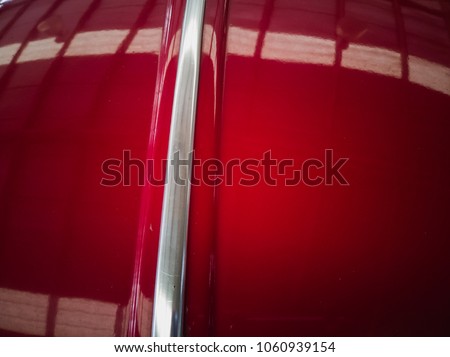The red bonnet made of steel.Colorful car.