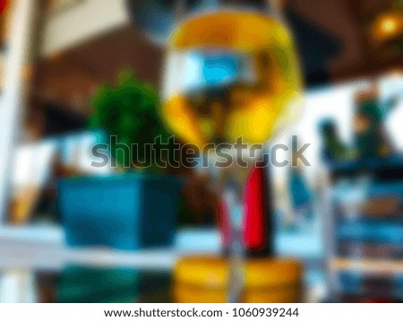 Picture blurred for background abstract. Blur drink on the table in restaurant.