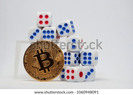 Bitcoin is a financial game. Bitcoin is Digital currency modern of Exchange Virtual payment money, Random cost of bitcoin concept, bitcoin and dices on white table. 