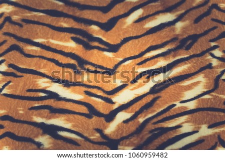 artificial tiger skin pattern baackground