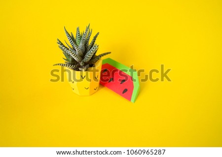 Tropical fruit paper on a yellow background. Pineapple Orange Watermelon Fashion Hipster. Hot Summer Beach Vibes. Tropical Party Mood. Bright Color, Accessories, flower. Creative Fun Art Style.
