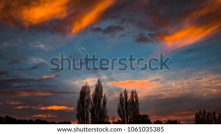 Dramatic colors in Autumn sunset makes for a dynamic image