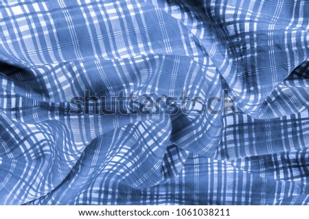 background texture. silk fabric checkered blue white Soft with a fine texture, this perfectly flowing fabric has an excellent drapery Thin, light and slightly translucent with the addition of elastane