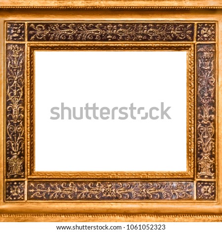 Gold wooden frame with carved ornament. Isolated on white