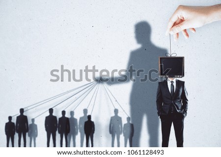 Creative TV manipulation and brainwash background with people and shadows Royalty-Free Stock Photo #1061128493