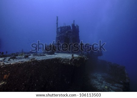 The USCG Duane in Key Largo, Florida. A sunken shipwreck in the John Pennekamp State park. A ship sunk intentionally as an artificial reef. Royalty-Free Stock Photo #106113503
