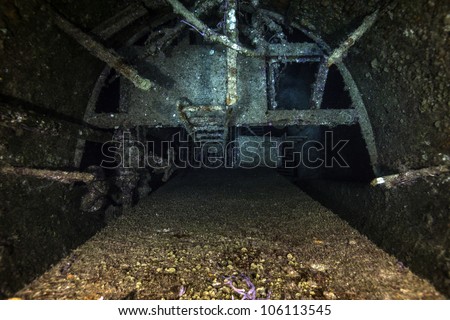 An inside look of the smokestack of the USCG Duane. A sunken shipwreck at the John Pennekamp State Park in Key Largo, Florida. A haven for technical divers. Royalty-Free Stock Photo #106113545