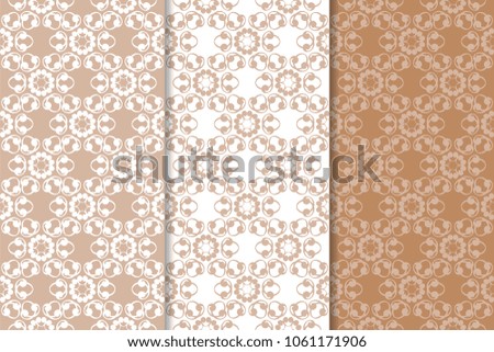 Brown floral backgrounds. Set of seamless patterns for textile and wallpapers