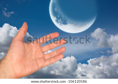 hand in the sky with moon
