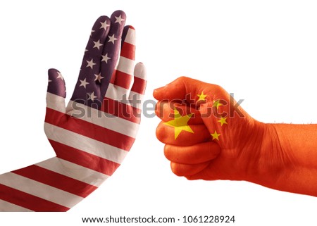 Trade conflict, USA flag on a stop hand and China flag on a fist, isolated against a white background