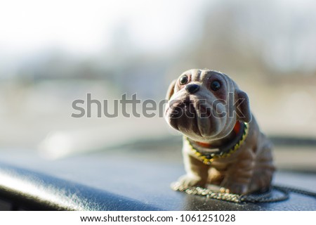 Bobble head dog
 Royalty-Free Stock Photo #1061251028