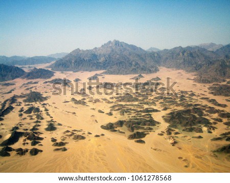 Aerial photo of desert in Africa with mountains