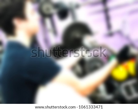 Training apparatus in gym. Blurred picture of gym. The abstract blur fitness gym background 