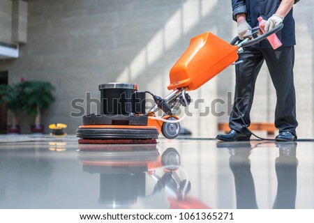 Floor care and cleaning services with washing machine Royalty-Free Stock Photo #1061365271