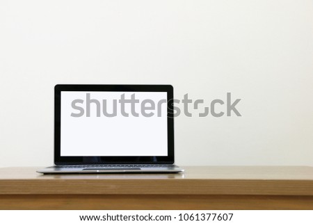Blank screen Laptop computer on the table