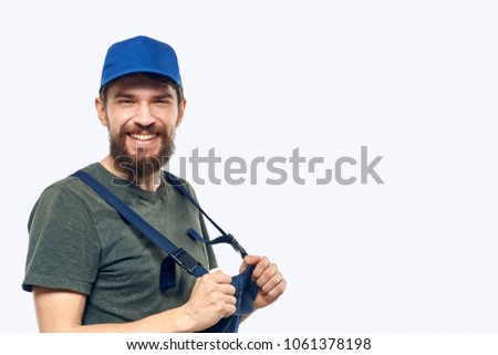  man deliverer in overalls                              