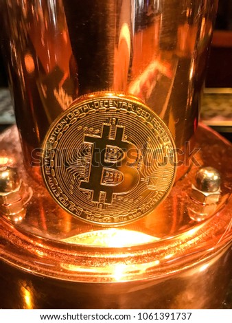 Bitcoin coin and Brass beer Tap 