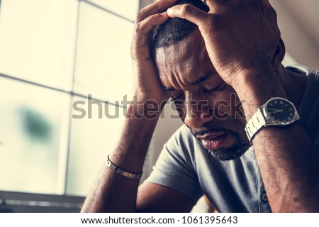 Black guy stressting and headache Royalty-Free Stock Photo #1061395643