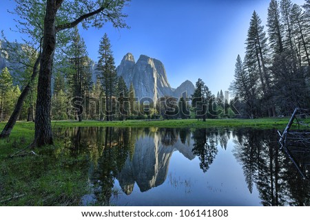Yosemite Valley is a glacial valley in Yosemite National Park in the western Sierra Nevada mountains of California, carved out by the Merced River. Royalty-Free Stock Photo #106141808
