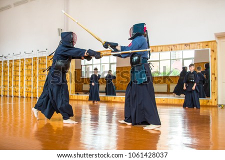 Struggle with the Kendo Sword School, training, men and children Royalty-Free Stock Photo #1061428037
