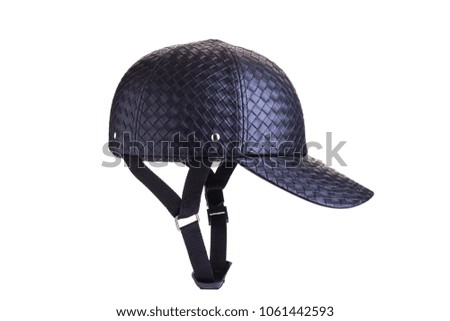 New black leather safety helmet. Studio shot and isolated on white background