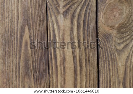 Colored background of light wooden boards arranged vertically.
