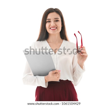 Portrait of female teacher with clipboard on white background
