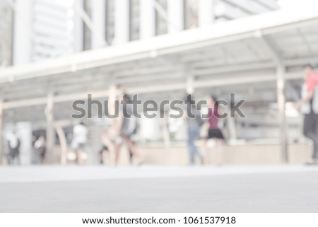 white blurred of people walking in city town. Defocused blur background.