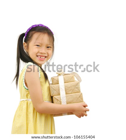 Little Asian girl arms out holding a beautiful wrapped present